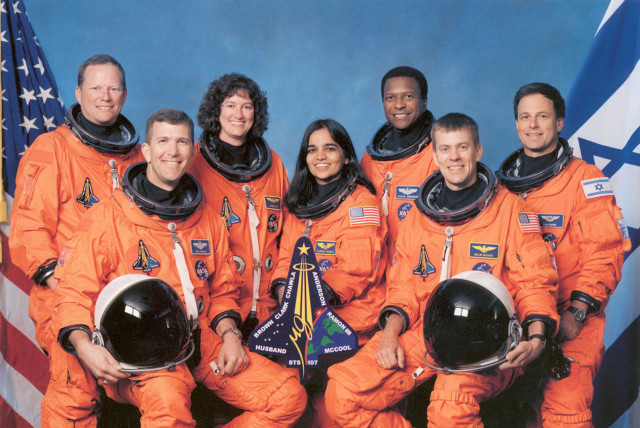  Space Shuttle Columbia mission STS-107 pose at Johnson Space Center in Houston in this January 1,2002 NASA handout photo. Left to right: David Brown, Rick Husband, Laurel Clark, Kalpana Chawla, Michael Anderson, William McCool, Ilan Ramon. (credit: REUTERS)