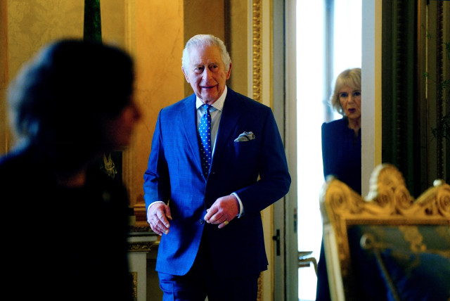  King Charles III and Camilla, the Queen Consort arrive before meeting with genocide survivors at Buckingham Palace, London, to mark Holocaust Memorial Day, in Britain January 27, 2023 (credit: VICTORIA JONES/POOL VIA REUTERS)