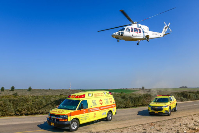  Hatzolah Air Medivac Helicopter simulation with Magen David Adom ambulance in Israel. (credit: Courtesy of Magen David Adom)