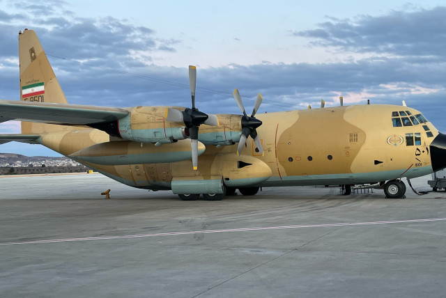  An Iranian military plane sits on the tarmac in Turkey next to an Israeli aid plane. (credit: MICHAEL STARR)