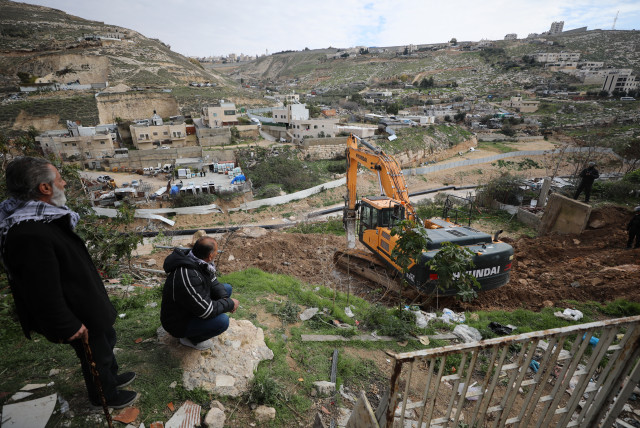  Houses are seen being demolished in the east Jerusalem neighborhood of Jebl Mukaber, on February 13, 2023. (credit: JAMAL AWAD/FLASH90)