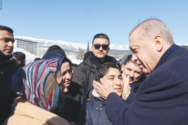  TURKISH PRESIDENT Recep Tayyip Erdogan meets with people in the aftermath of the deadly earthquake in Kahramanmaras Province, last week. (credit: PRESIDENTiAL PRESS OFFICE/REUTERS)