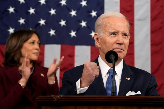 President Joe Biden delivers the State of the Union address to a joint session of Congress at the Capitol, Tuesday, Feb. 7, 2023, in Washington, as Vice President Kamala Harris applauds. (credit: Jacquelyn Martin/Pool via REUTERS)