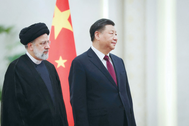  IRANIAN PRESIDENT Ebrahim Raisi meets Chinese President Xi Jinping in Beijing, last month. With attention focused on the US-Chinese rivalry, Iran is making steady progress toward nuclear capability, says the writer.  (credit: IRAN'S PRESIDENTIAL WEBSITE/WEST ASIA NEWS AGENCY/REUTERS)