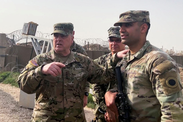 US Joint Chiefs Chair Army General Mark Milley speaks with US forces in Syria during an unannounced visit at a US military base in northeast Syria, March 4, 2023. (credit: REUTERS/PHIL STEWART/FILE PHOTO)