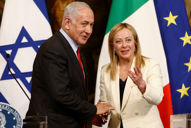  Italian Prime Minister Giorgia Meloni and Israeli Prime Minister Benjamin Netanyahu shake hands during a news conference after their meeting at Palazzo Chigi, in Rome, Italy, March 10, 2023.  (credit: REUTERS/GUGLIELMO MANGIAPANE)