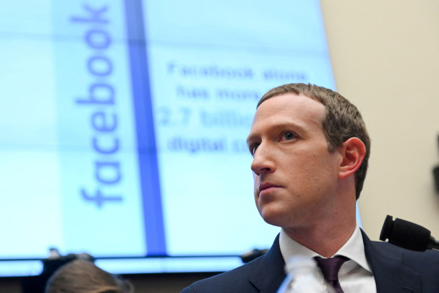  Facebook Chairman and CEO Mark Zuckerberg testifies at a House Financial Services Committee hearing in Washington, U.S., October 23, 2019 (credit: REUTERS/ERIN SCOTT/POOL/FILE PHOTO)