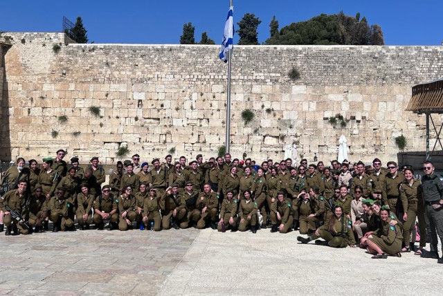  122 SOLDIERS graduating from the Nativ military conversion program celebrate at the Kotel, May 2022.  (credit: IDF SPOKESPERSON'S UNIT)