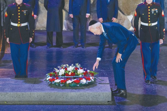  US PRESIDENT Joe Biden lays a wreath in the Hall of Remembrance at Yad Vashem, last July. It is sometimes forgotten that Washington didn’t declare war on the Nazis – it was Hitler who declared war on the US.  (credit: OLIVIER FITOUSSI/FLASH90)