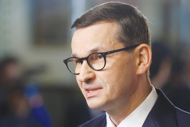  POLISH PRIME Minister Mateusz Morawiecki announced, in 2021, that his government would under no circumstances pay Jews a single zloty, euro or dollar. (credit: JONATHAN ERNST/REUTERS)