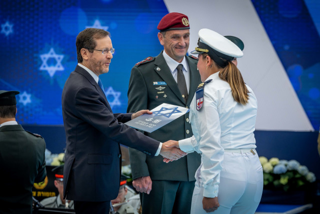  Israeli president Isaac Herzog and IDF Chief of Staff Herzi Halevi with outstanding soldiers during an event part of Israel's 75th Independence Day celebrations, at the President's residence in Jerusalem on April 26, 2023. (credit: YONATAN SINDEL/FLASH90)