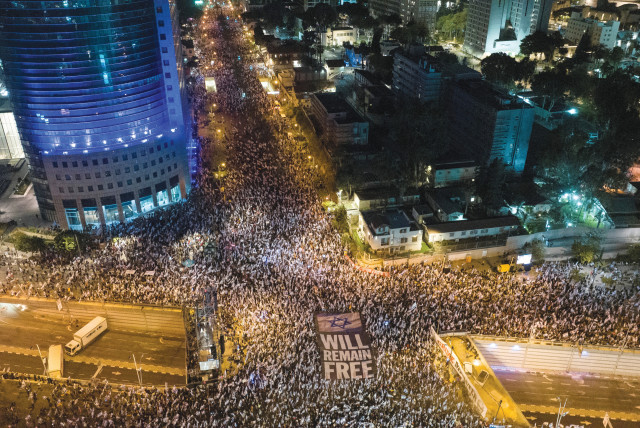  An aerial view shows people demonstrating against the government’s judicial overhaul plans in Tel Aviv on April 15, 2023.  (credit: ILAN ROSENBERG/REUTERS)