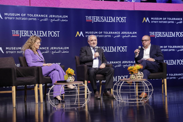  Sonia Gomes de Mesquita and Robert Singer are seen being interviewed by Zvika Klein at The Jerusalem Post's Celebrate the Faces of Israel 2023 conference at the Museum of Tolerance Jerusalem, on April 27, 2023. (credit: MARC ISRAEL SELLEM/THE JERUSALEM POST)