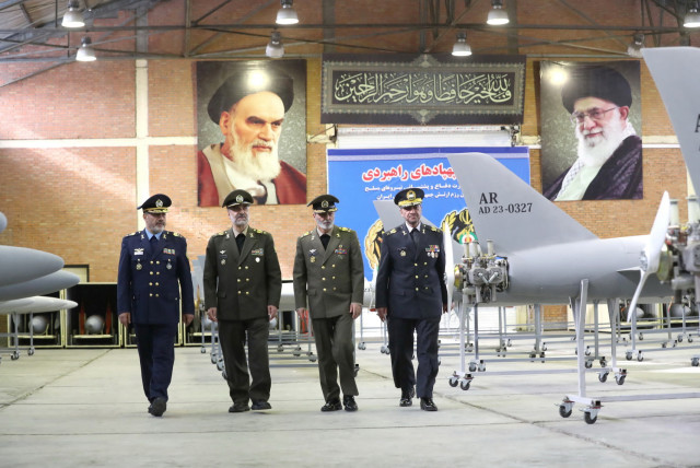  Iran's Army chief Major General Abdolrahim Mousavi and Defense Minister Brigadier General Mohammad-Reza Ashtiani visit a drone site at an undisclosed location in Iran, in this handout image obtained on April 20, 2023. (credit: IRANIAN ARMY/WANA/REUTERS)