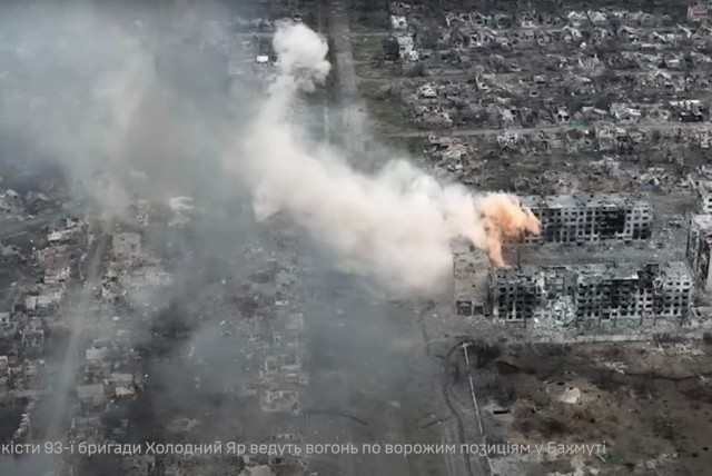  An aerial view shows smoke rising in the front line town of Bakhmut, amid Russia's attack on Ukraine, in Donetsk region, Ukraine in this screengrab obtained from a video released on April 22, 2023 by 93rd Mechanized Brigade 'Kholodnyi Yar'. (credit: 93rd Mechanized Brigade 'Kholodnyi Yar'/Handout via REUTERS)