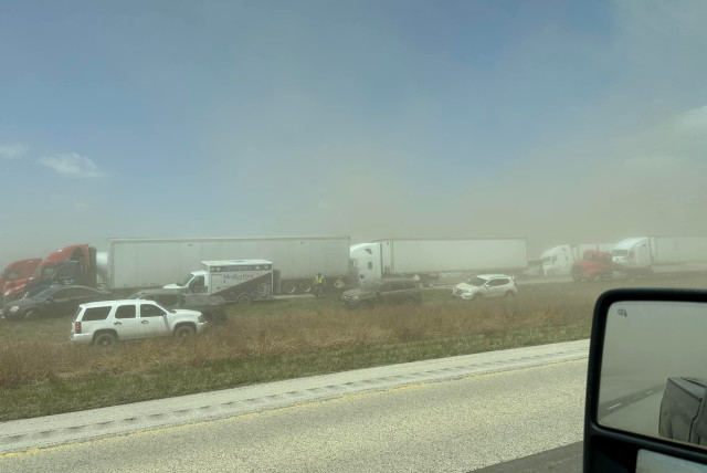  A view of vehicles in a dust storm, which cut visibility to near zero and triggered a series of chain-reaction crashes involving dozens of vehicles, on a highway in Springfield, Illinois, U.S. May 1, 2023 in this picture obtained from social media.  (credit: Thomas DeVore via TMX/via REUTERS)
