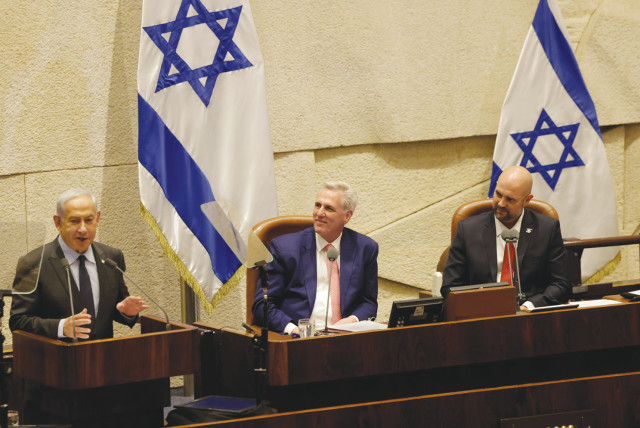  PRIME MINISTER Benjamin Netanyahu addresses the Knesset plenum on Monday, as US House Speaker Kevin McCarthy and Knesset Speaker Amir Ohana look on.  (photo credit: Marc Israel Sellem/Jerusalem Post)