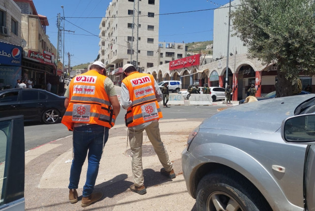  United Hatzalah medics at the scene of the May 4, 2023 Huwara stabbing.  (credit: UNITED HATZALAH‏)