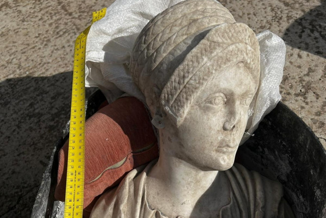 A view of a marble bust believed to represent Salonia Matidia, niece of Roman emperor Trajan, which was among the stolen artefacts that were recovered during a crackdown on international art trafficking, at an unknown location, in Spain, in this undated handout picture obtained by Reuters on May 4,  (credit: Courtesy of Europol/Handout via REUTERS )