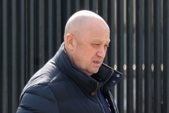  Founder of Wagner private mercenary group Yevgeny Prigozhin leaves a cemetery before the funeral of Russian military blogger Maxim Fomin widely known by the name of Vladlen Tatarsky, who was recently killed in a bomb attack in a St Petersburg cafe, in Moscow, Russia, April 8, 2023.  (credit: REUTERS/Yulia Morozova)