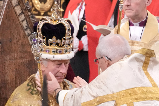  King Charles III receives The St Edward's Crown during his coronation ceremony in Westminster Abbey, London.  (credit: JONATHAN BRADY/POOL VIA REUTERS)