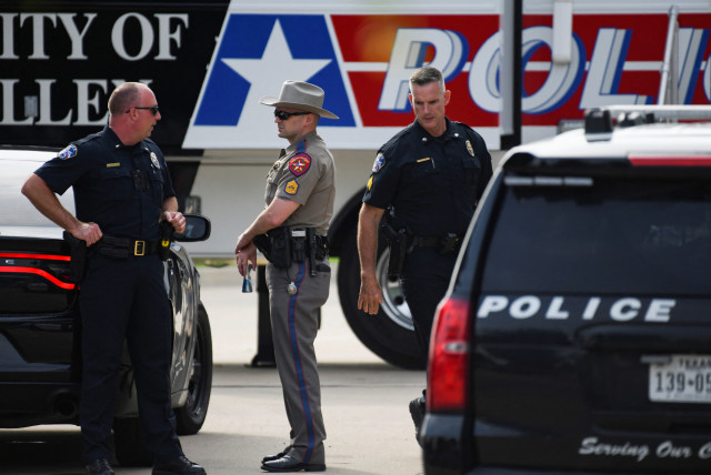  Officers with the Allen Police Department man the mobile command post the day after a gunman shot multiple people at the Dallas-area Allen Premium Outlets mall in Allen, Texas, US May 7, 2023. (credit: REUTERS/Jeremy Lock)