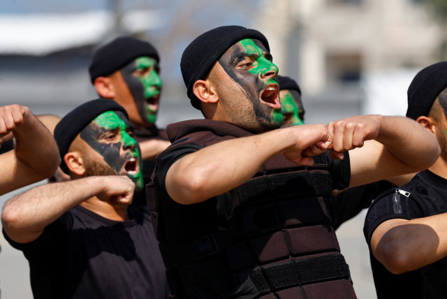  Members of Palestinian security forces loyal to Hamas, take part in a graduation ceremony in Gaza City, February 27, 2023. (credit: MOHAMMED SALEM/REUTERS)