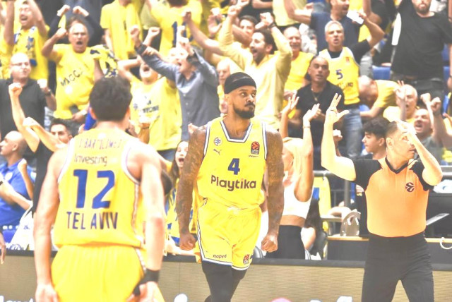  LORENZO BROWN (4) and Maccabi Tel Aviv have already taken a road win over Monaco in their Euroleague quarterfinal. They will have to do so again tonight to advance (credit: Dov Halickman)