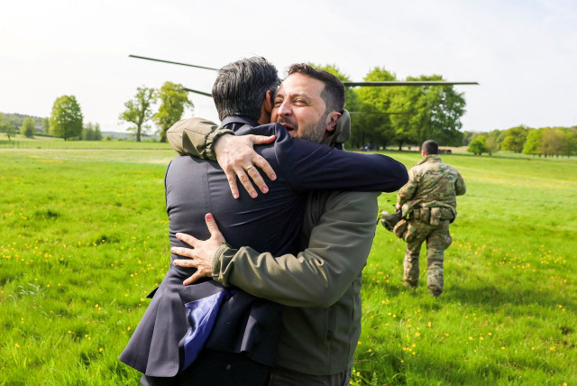  Britain's Prime Minister Rishi Sunak hugs Ukraine's President Volodymyr Zelensky in Aylesbury, Britain, May 15, 2023. (credit: Rishi Sunak via Twitter/Handout via REUTERS)