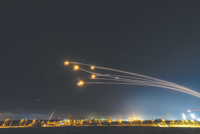  THE IRON Dome air defense system intercepts rockets fired from the Gaza Strip, as seen from Sderot, on Saturday. Over a thousand rockets were fired from the Gaza Strip, but the US wants Israel to stop.  (credit: YONATAN SINDEL/FLASH90)