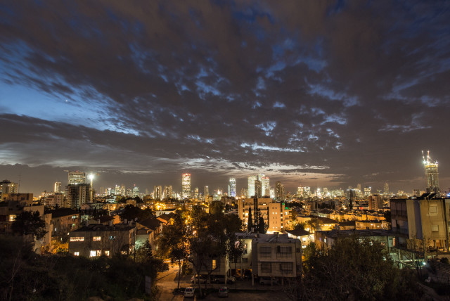  A nighttime view of Givatayim.  (credit: YONI LERNER/WIKIMEDIA COMMONS)