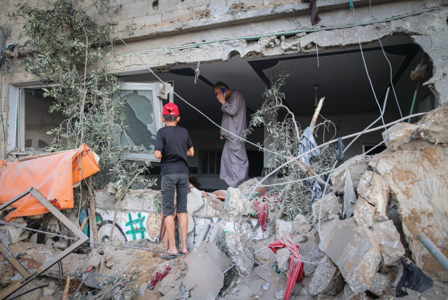  THE RUBBLE from a home struck in an Israeli attack, last Saturday, in Gaza City. (photo credit: ATIA MOHAMMED/FLASH90)