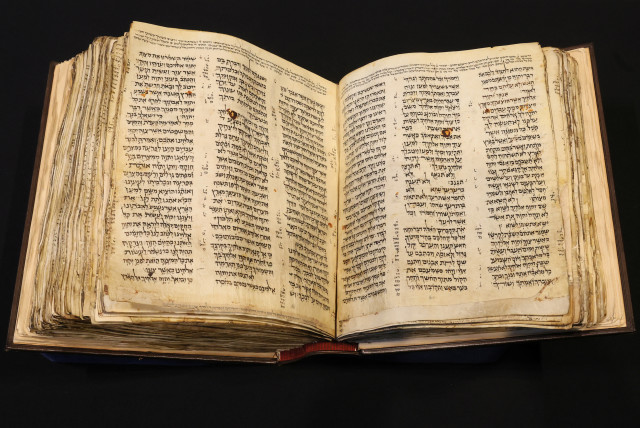  The Codex Sassoon, the earliest and most complete Hebrew Bible ever discovered which is estimated to sell for between $30 million and $50 million, is displayed at Sotheby's in New York City, New York US, February 15, 2023. (credit: REUTERS/BRENDAN MCDERMID)