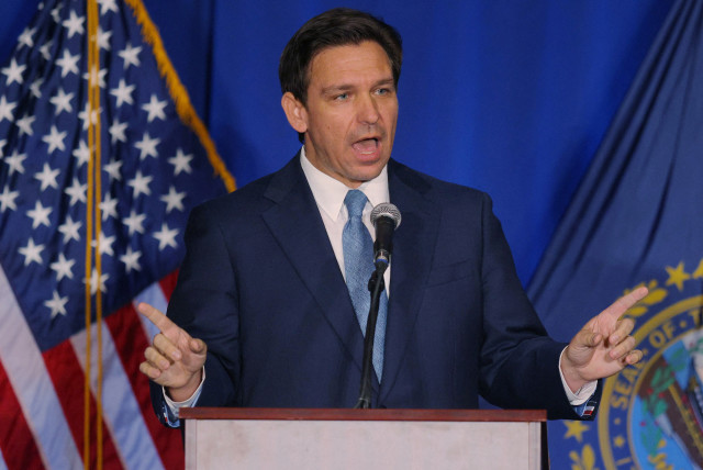  Florida Governor Ron DeSantis speaks at the 2023 NHGOP Amos Tuck Dinner in Manchester, New Hampshire, US, April 14, 2023. (credit: REUTERS/BRIAN SNYDER)