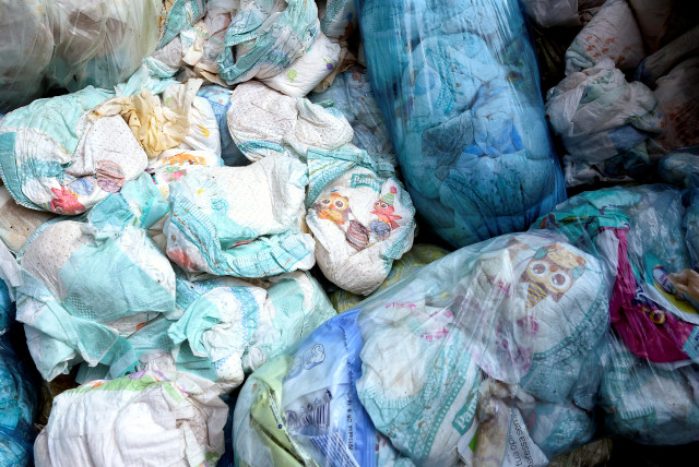  Used diapers are seen in a diaper recycling facility in Spresiano near Treviso, northern Italy, August 31, 2018.