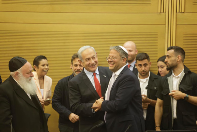  Prime Minister Benjamin Netanyahu and National Security Minister Itamar Ben-Gvir embrace ahead of the 2023 budget vote. (credit: MARC ISRAEL SELLEM/THE JERUSALEM POST)