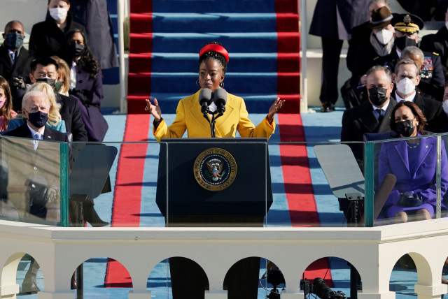 Poet Amanda Gorman reads a poem during the 59th Presidential Inauguration at the US Capitol in Washington January 20, 2021. (credit: PATRICK SEMANSKY/POOL VIA REUTERS)