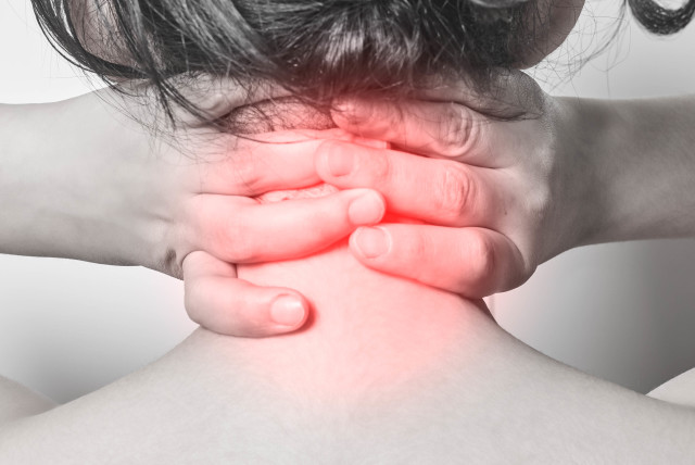 Neck and back pain (illustrative).  (photo credit: MARCO VERCH PROFESSIONAL PHOTOGRAPHER AND SPEAKER/FLICKR)