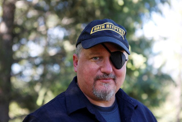  Oath Keepers militia founder Stewart Rhodes poses during an interview session in Eureka, Montana, U.S. June 20, 2016. (photo credit: REUTERS/Jim Urquhart/File Photo)