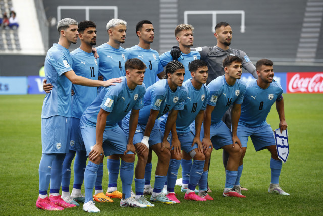  May 24, 2023 Israel players pose for a team group photo before the match (photo credit: AGUSTIN MARCARIAN/REUTERS)