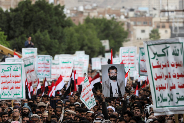  Houthi supporters rally to mark the 8th anniversary of the Saudi-led military intervention in Yemen's conflict, in Sanaa, Yemen March 26, 2023. (credit: REUTERS/KHALED ABDULLAH)