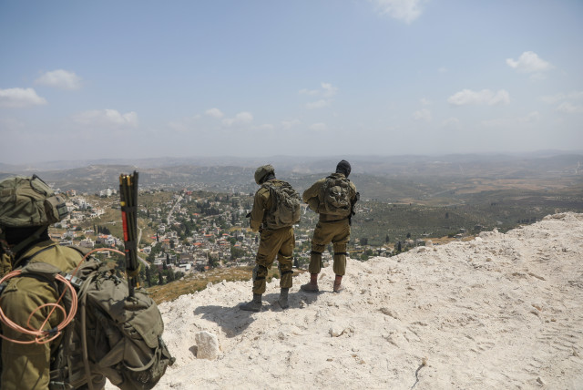  Israeli soldiers guard at the outpost of Homesh, in the West Bank, on May 29, 2023.  (credit: FLASH90)