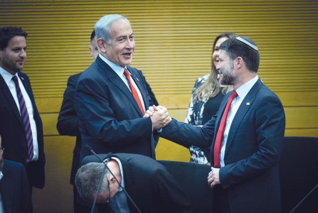  PRIME MINISTER Benjamin Netanyahu greets Finance Minister and Minister in the Defense Ministry Bezalel Smotrich in the Knesset, last week. (credit: YONATAN SINDEL/FLASH90)