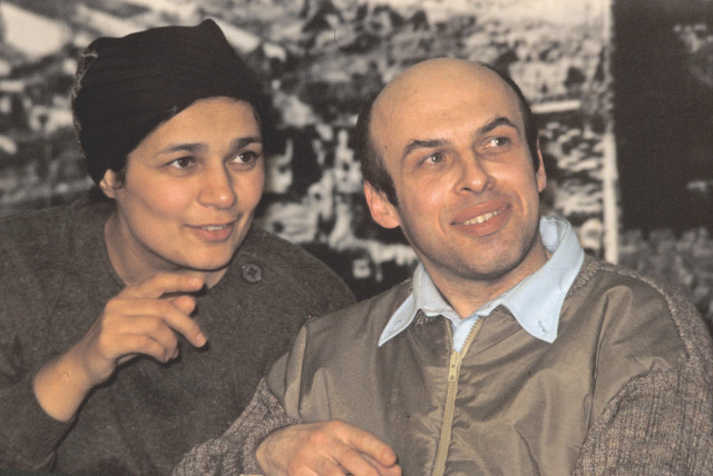  AVITAL AND Natan Sharansky, reunited after 12 years, smile during an airport news conference upon his arrival in Israel, in 1986. The dynamic for Soviet Jewry changed with the founding of SSSJ, says the writer. (photo credit: HAVAKUK LEVISON / REUTERS)
