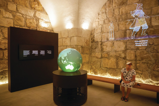  AN INTERACTIVE globe shows visitors how far various cities are from Jerusalem, in a room describing the city’s chronological history. (credit: MARC ISRAEL SELLEM)