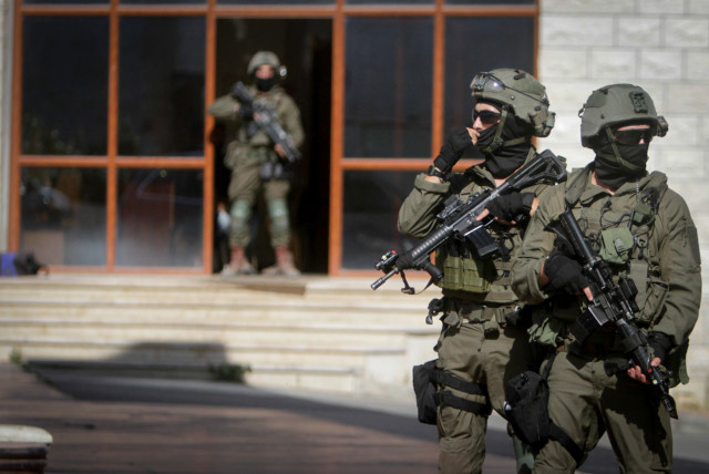  Israeli soldiers search the West Bank village of Qafin for the suspected gunmen who shot and killed an Israeli civilian near the entrance to a Jewish settlement of Hermesh, May 30, 2023