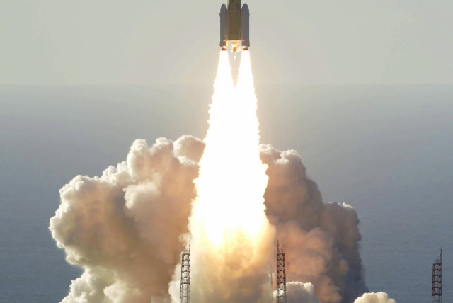 An H-2A rocket carrying the Hope Probe, developed by the Mohammed Bin Rashid Space Centre (MBRSC) in the United Arab Emirates (UAE) for the Mars explore, lifts off from the launching pad at Tanegashima Space Center on the southwestern island of Tanegashima, Japan, in this photo taken by Kyodo July 2 (credit: KYODO/VIA REUTERS)
