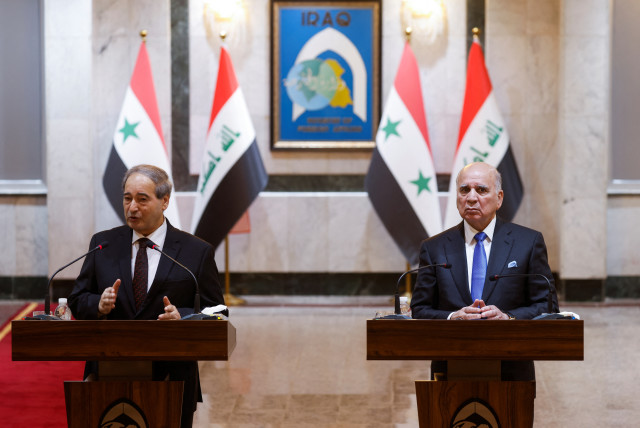  Syrian Foreign Minister Faisal Mekdad and his Iraqi counterpart Fuad Hussein attend a joint press conference, in Baghdad, Iraq June 4, 2023. (credit: AHMED SAAD/REUTERS)