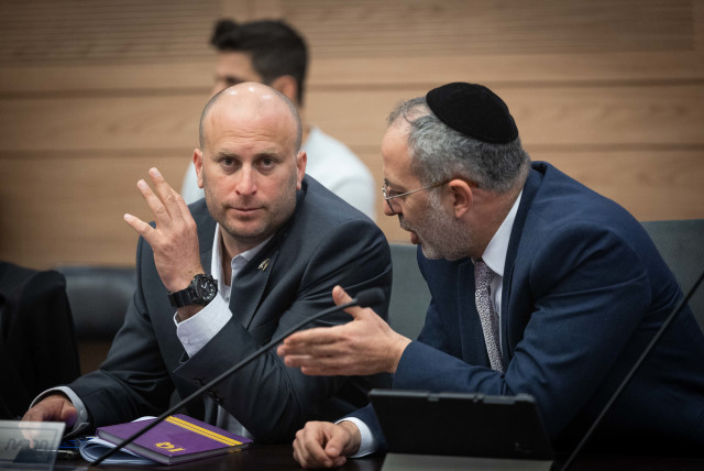  MK Yitzhak Kroizer (L) attends a Constitution committee meeting at the Knesset, the Israeli Parliament in Jerusalem, on February 28, 2023 (credit: YONATAN SINDEL/FLASH90)