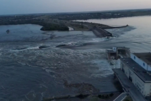  A general view of the Nova Kakhovka dam that was breached in Kherson region, Ukraine June 6, 2023 in this screen grab taken from a video obtained by Reuters. (credit: REUTERS)